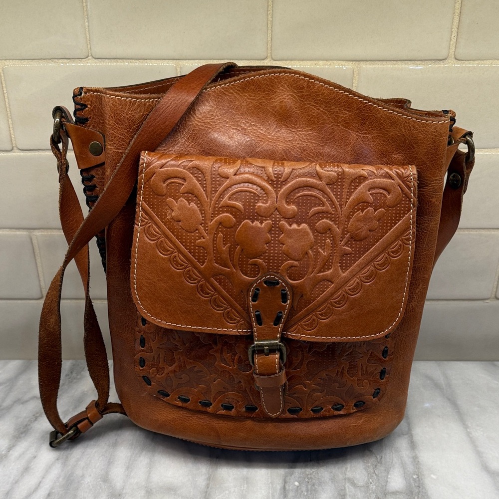 Patricia Nash Tan Embossed Crossbody Bag with a western style